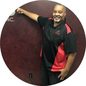 A person in a black suit

AI-generated content may be incorrect.